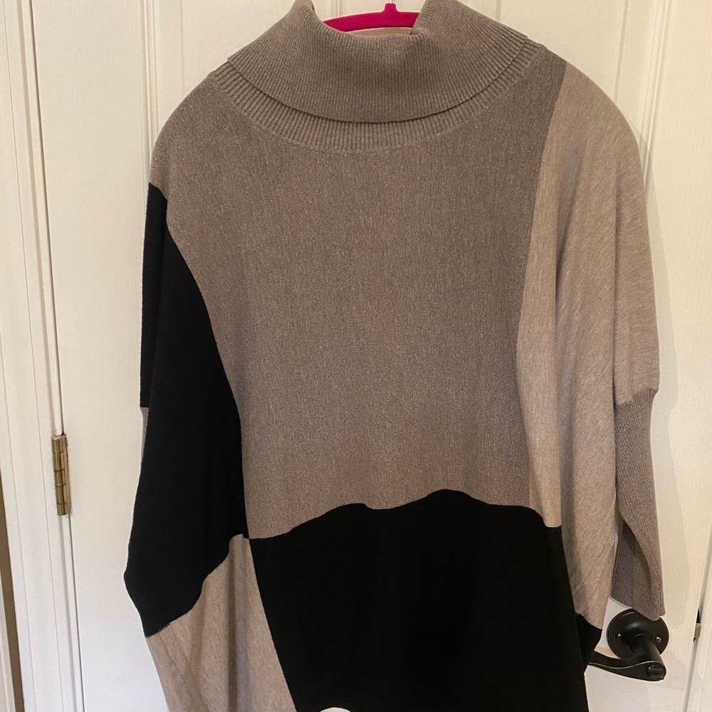 Color block poncho style sweater.